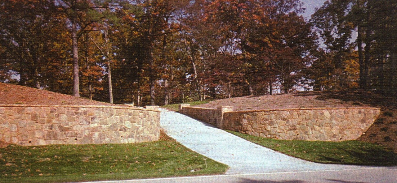 Large stone walls driveway